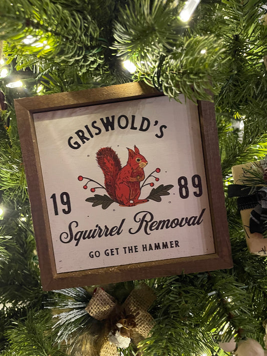 Griswold's Squirrel Removal Sign